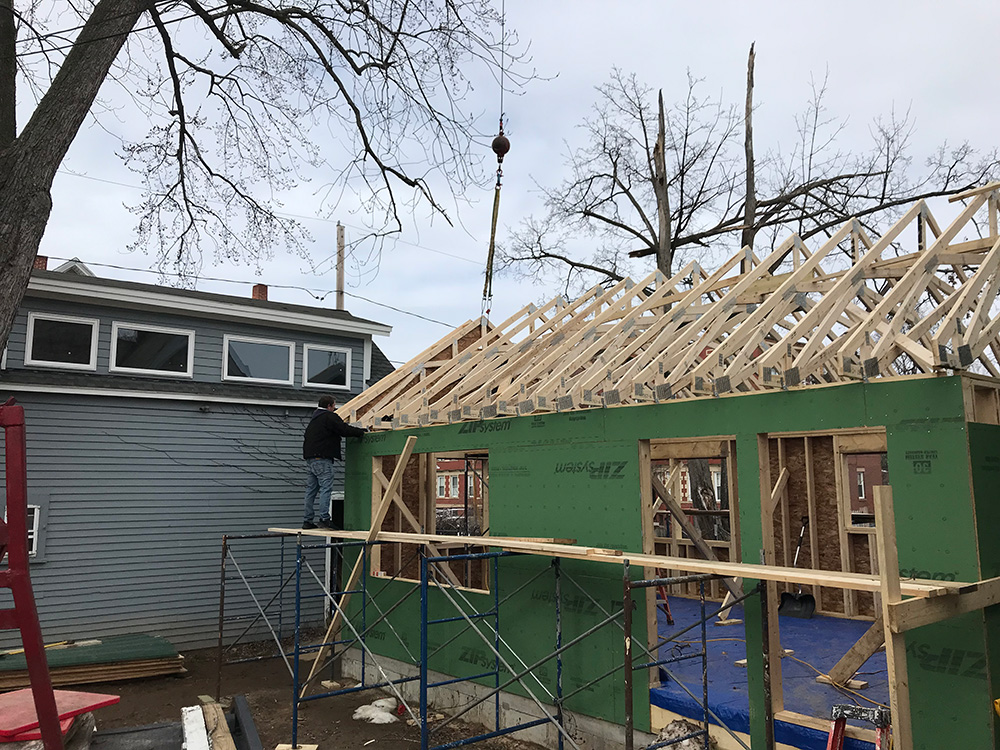 Setting trusses on a new addition in Holyoke