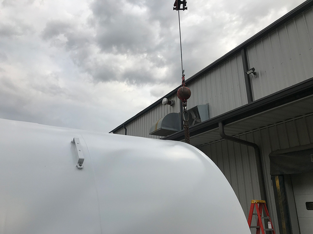 Worked with another crane operator, using two cranes to install a 40 ft storage tank at an industrial business